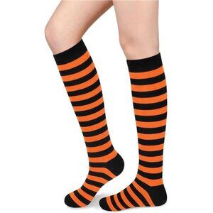 Women's knee-high athletic socks made from soft cotton, designed for comfort